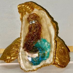 Oyster painted with mosaic glass mermaid